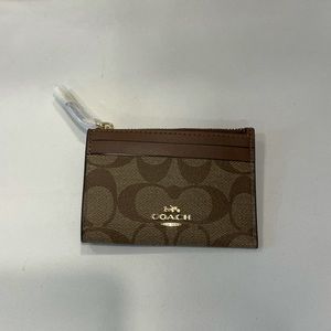 Band new Coach card case